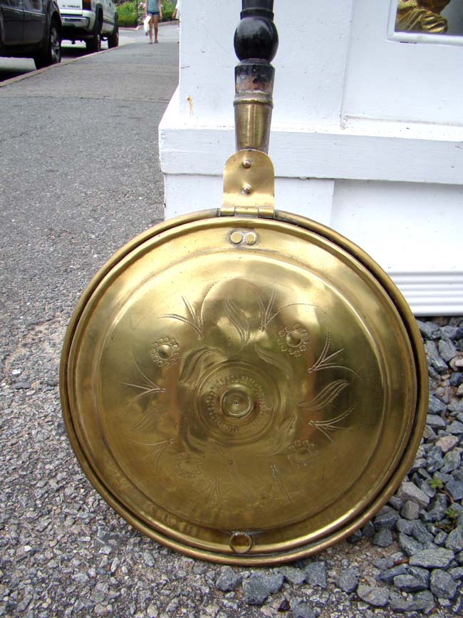An antique English bed warmer circa 1800-1850